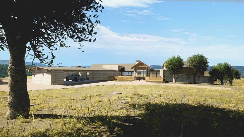 Modern ranch-style home on a vast landscape with varied terrain, surrounded by lush vegetation