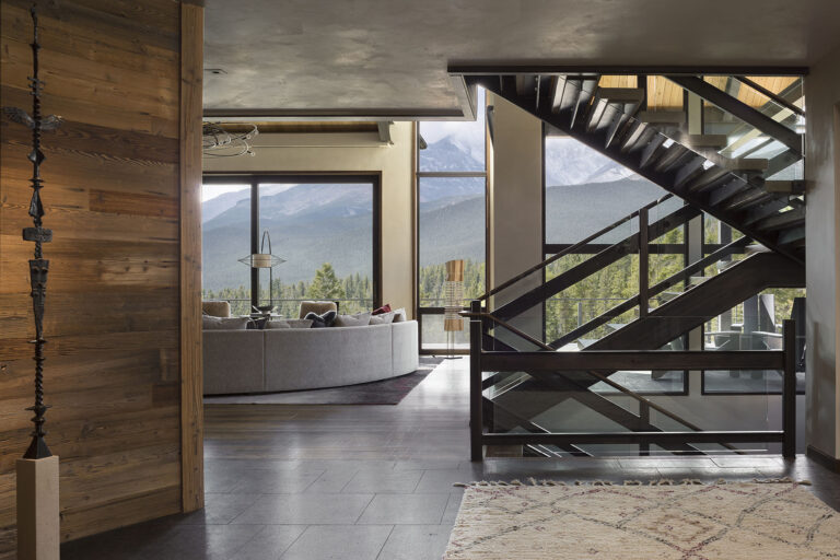 Timber Rock retreat in Estes Park, CO, with stunning views, suspended fireplace, and a kitchen